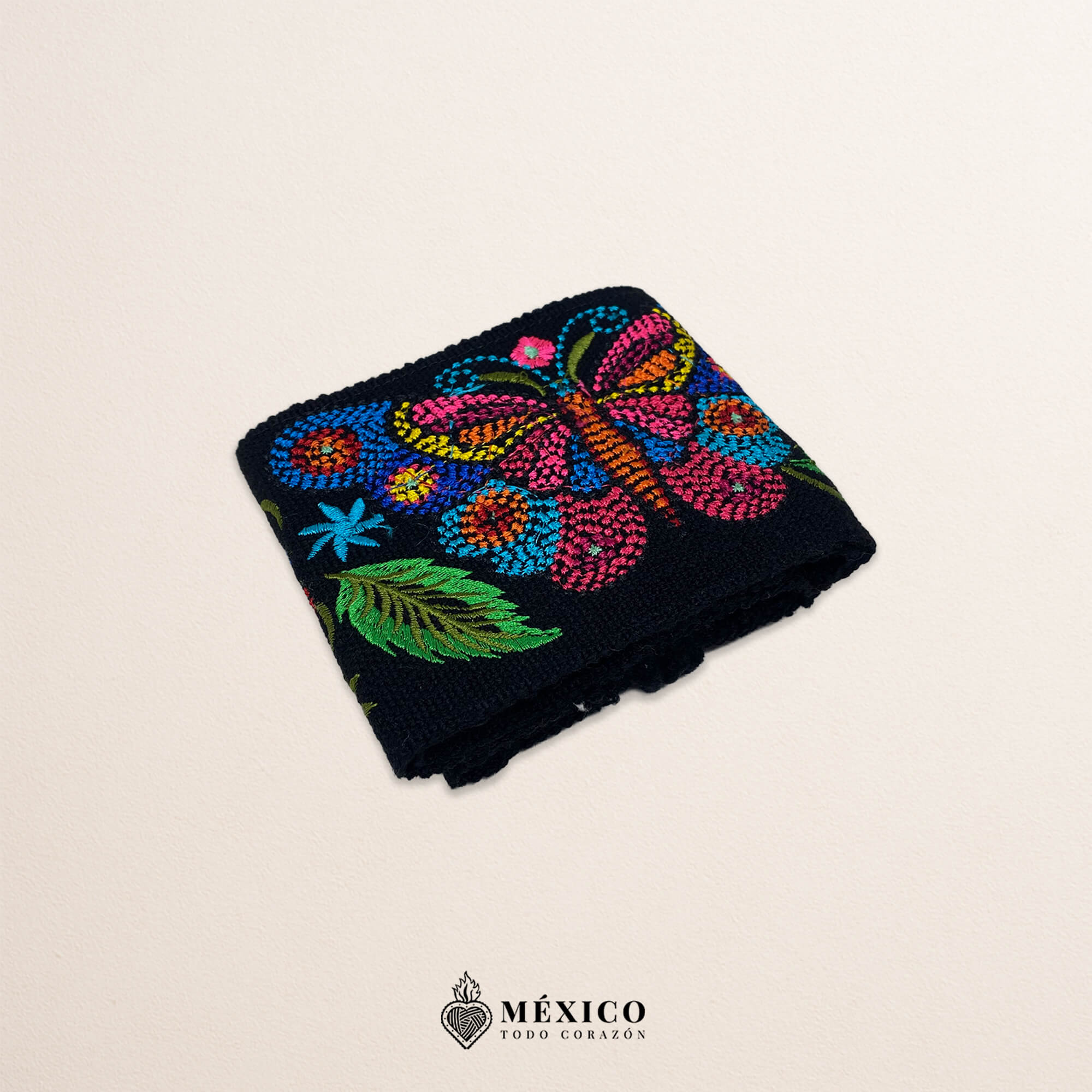 Black embroidered Mexican waist belt featuring a floral and butterfly design