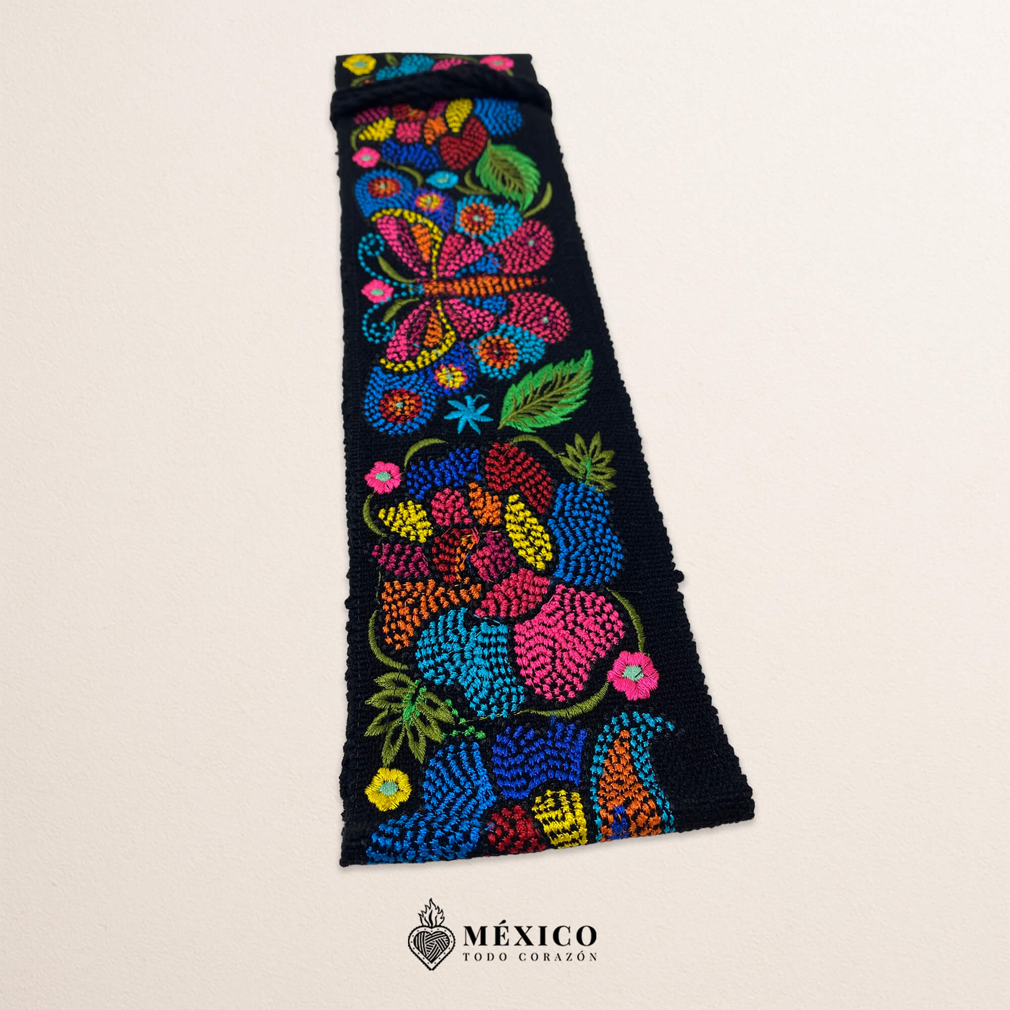 Black embroidered Mexican waist belt featuring a floral and butterfly design