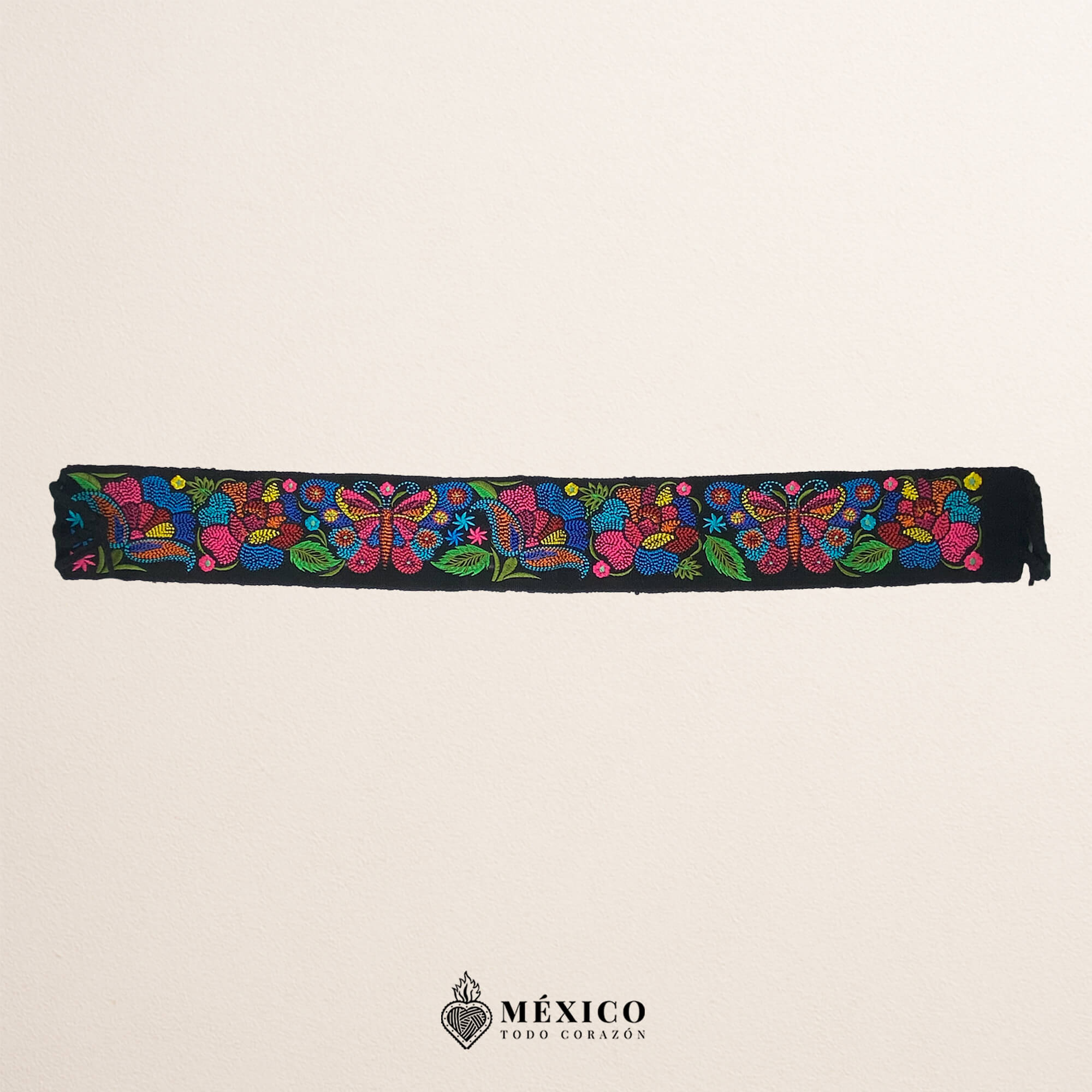 Black embroidered Mexican waist belt featuring a floral and butterfly design