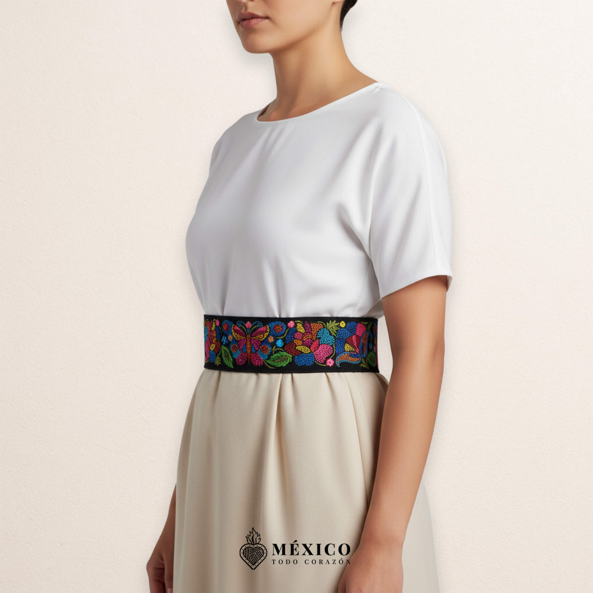 Black embroidered Mexican waist belt featuring a floral and butterfly design