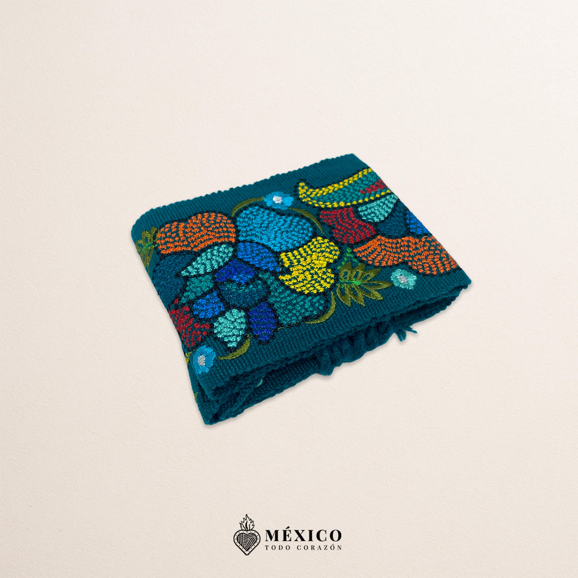 Turquoise embroidered Mexican waist belt featuring a floral and butterfly design