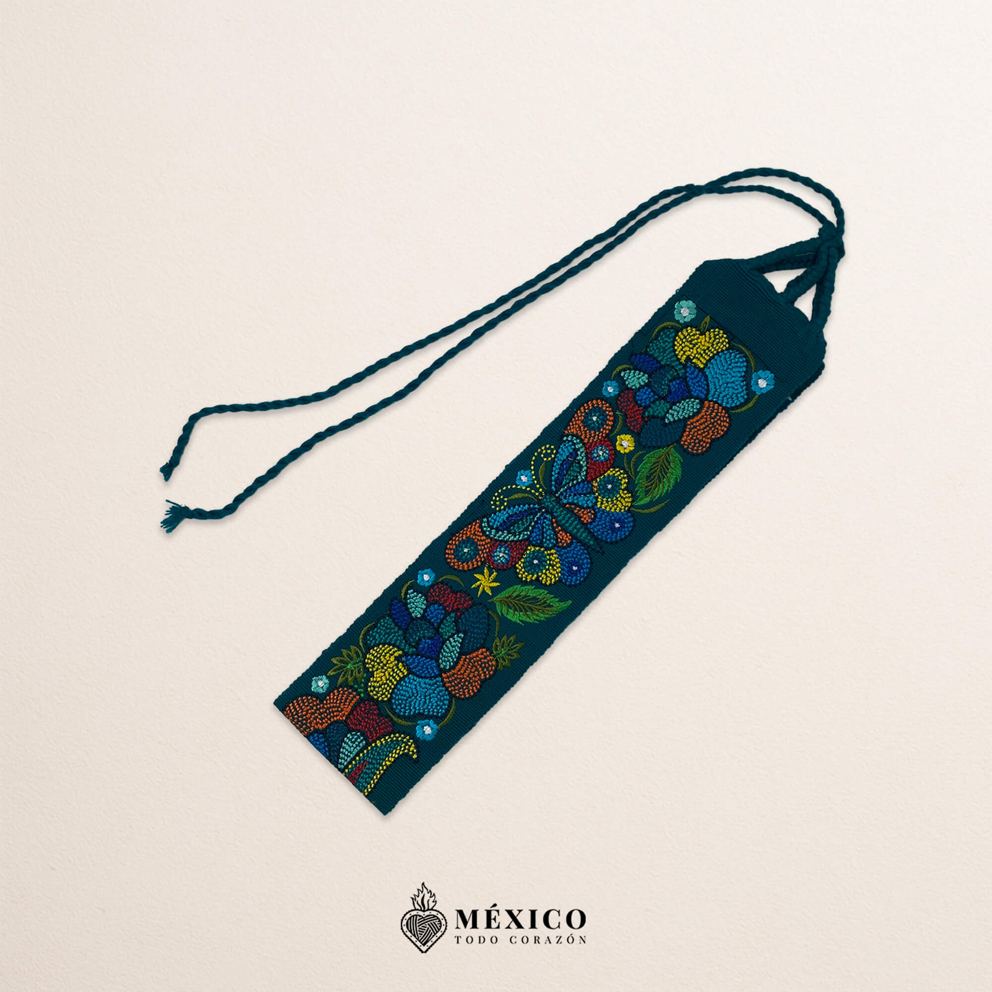 Turquoise embroidered Mexican waist belt featuring a floral and butterfly design