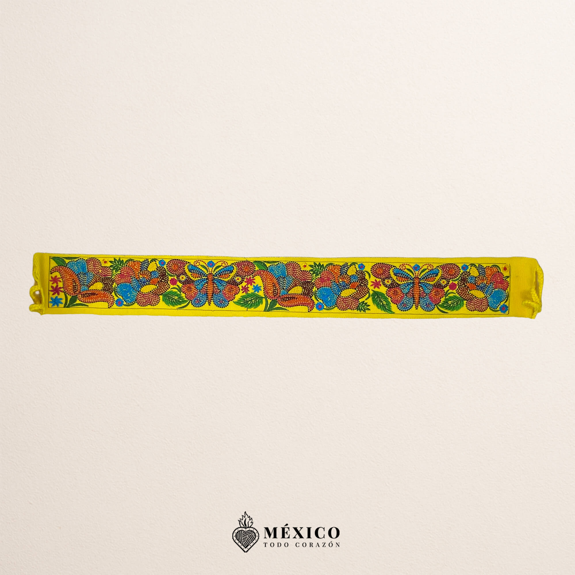 Yellow embroidered Mexican waist belt featuring a floral and butterfly design
