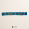 Light Blue embroidered Mexican waist belt featuring a floral and butterfly design