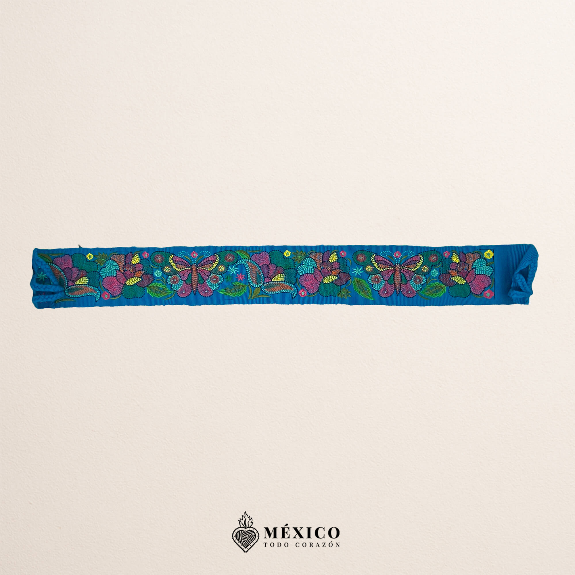 Light Blue embroidered Mexican waist belt featuring a floral and butterfly design