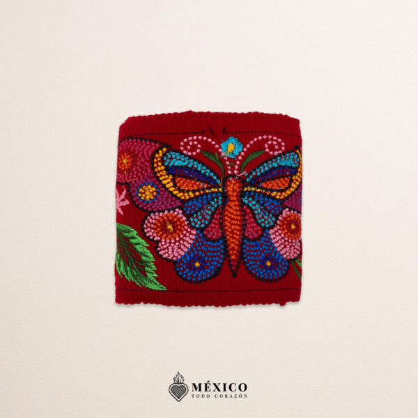 Red embroidered Mexican waist belt featuring a floral and butterfly design