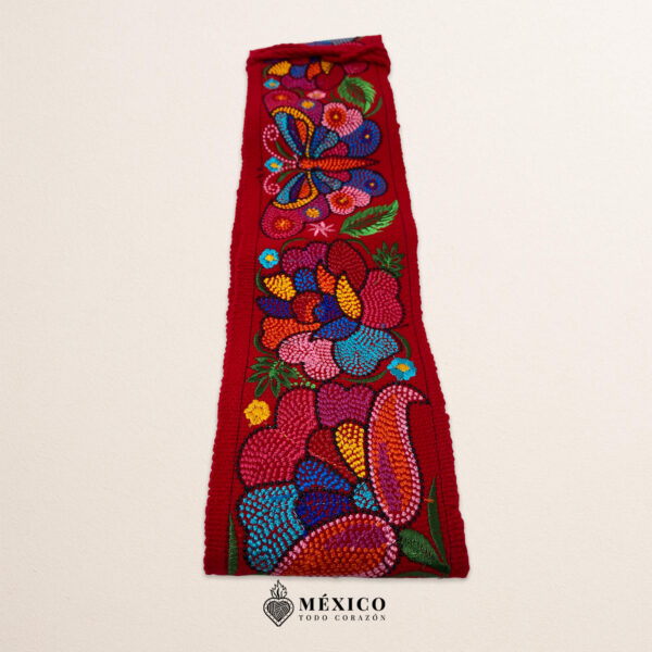 Red embroidered Mexican waist belt featuring a floral and butterfly design