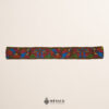Brown embroidered Mexican waist belt featuring a floral and butterfly design