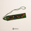 Green embroidered Mexican waist belt featuring a floral and butterfly design