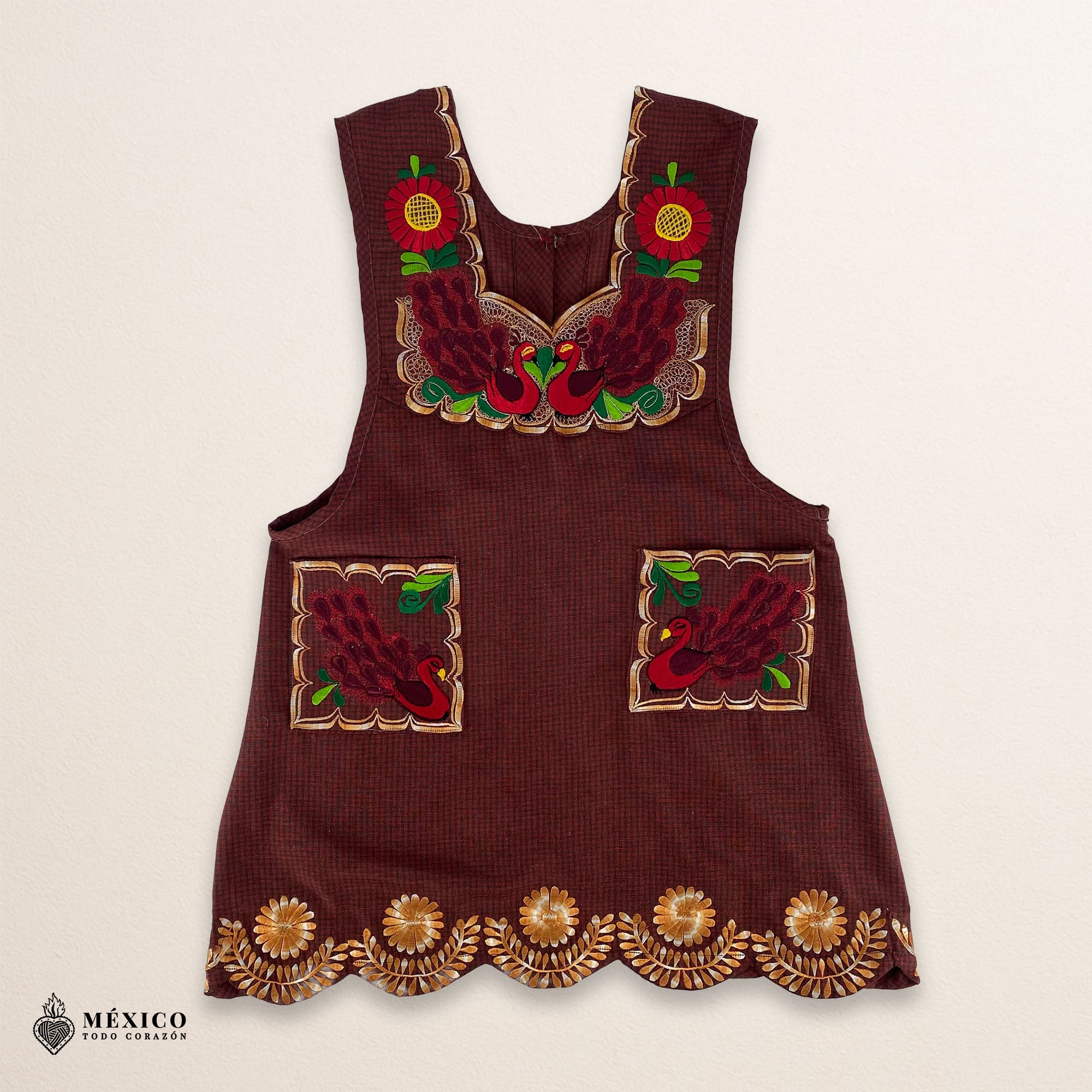 Red-brown Mexican embroidered apron with standard kitchen fit and detailed floral embroidery