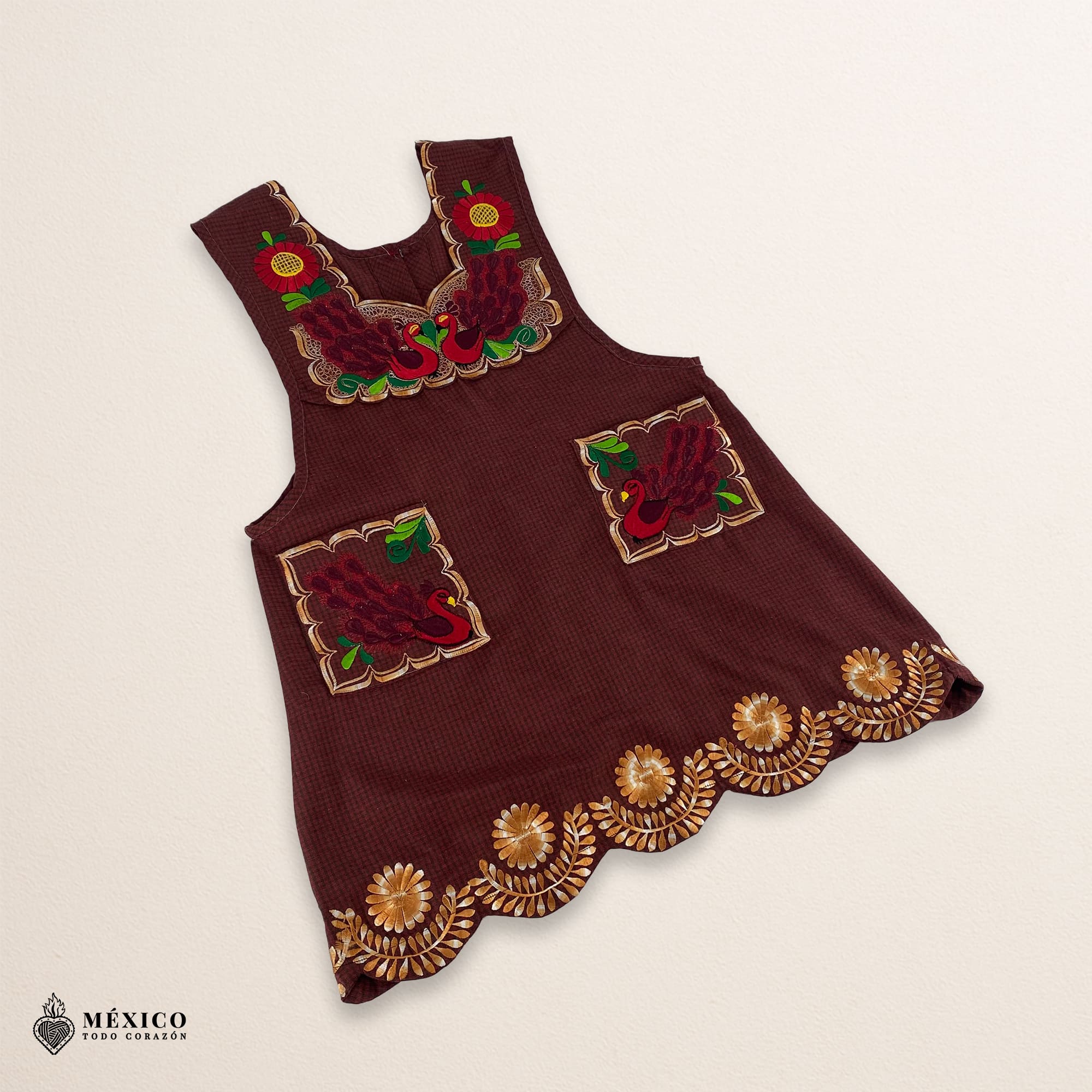 Red-brown Mexican embroidered apron with standard kitchen fit and detailed floral embroidery