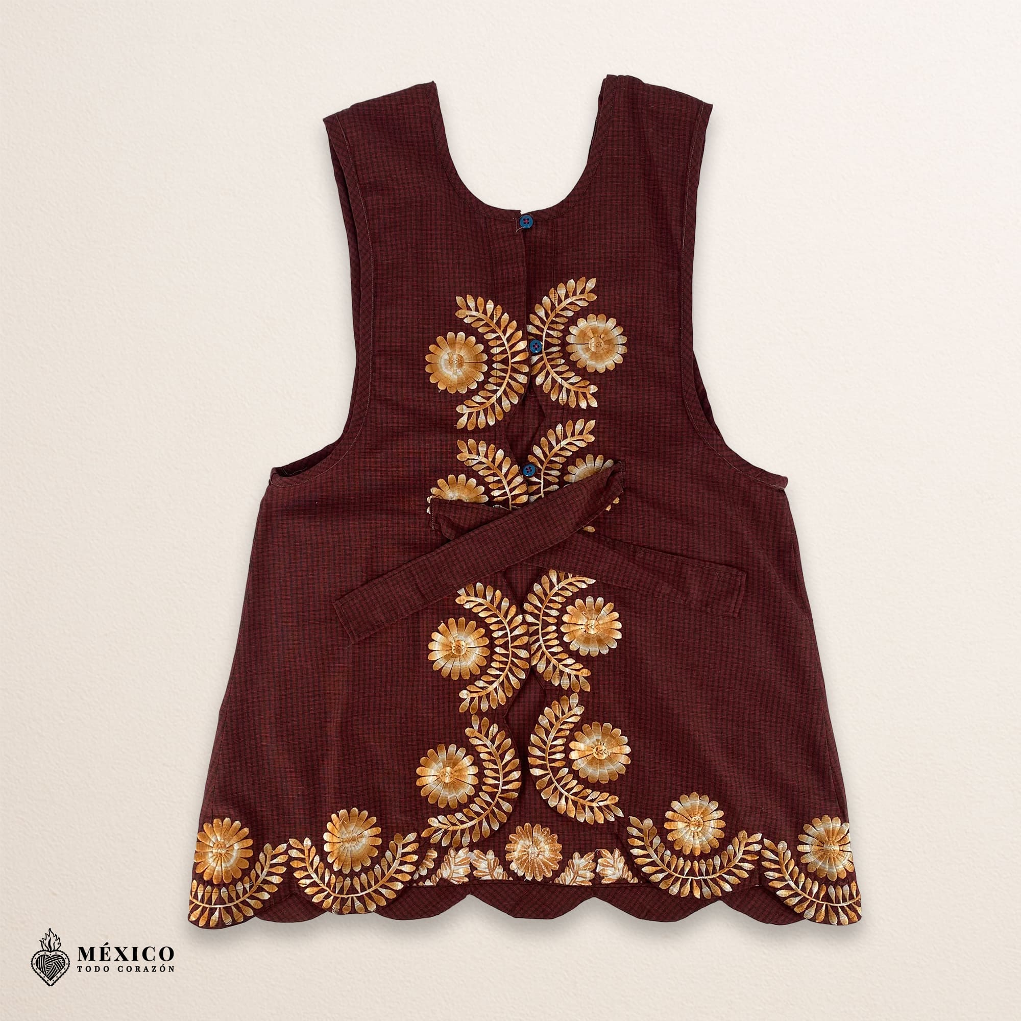 Red-brown Mexican embroidered apron with standard kitchen fit and detailed floral embroidery