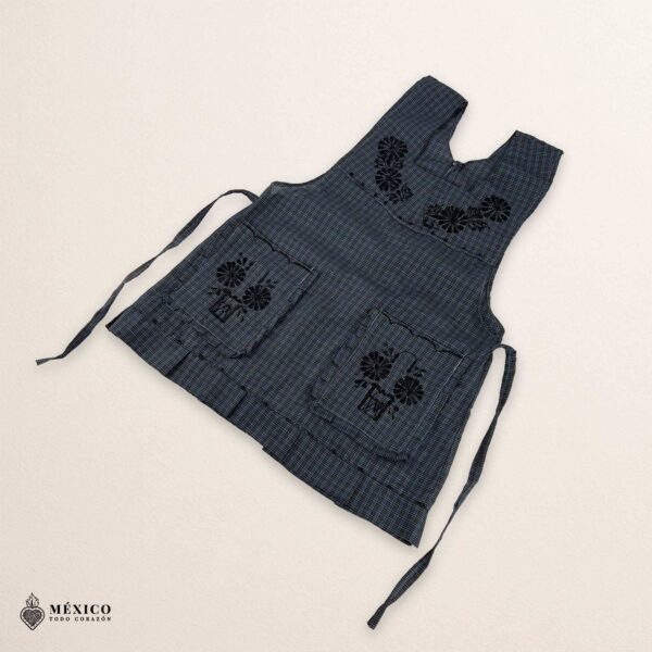 Black Mexican embroidered apron made of essential cotton, handmade kitchen apron featuring traditional floral embroidery inspired by Mexican craftsmanship