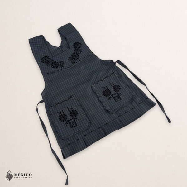 Black Mexican embroidered apron made of essential cotton, handmade kitchen apron featuring traditional floral embroidery inspired by Mexican craftsmanship