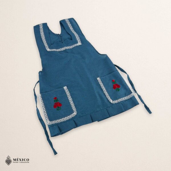 Blue Mexican embroidered apron made of essential cotton, handmade kitchen apron featuring traditional floral embroidery inspired by Mexican craftsmanship