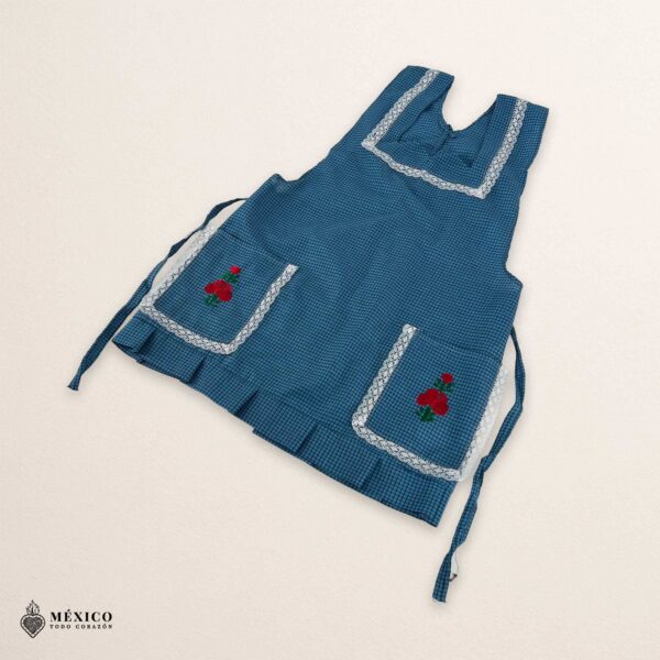 Blue Mexican embroidered apron made of essential cotton, handmade kitchen apron featuring traditional floral embroidery inspired by Mexican craftsmanship