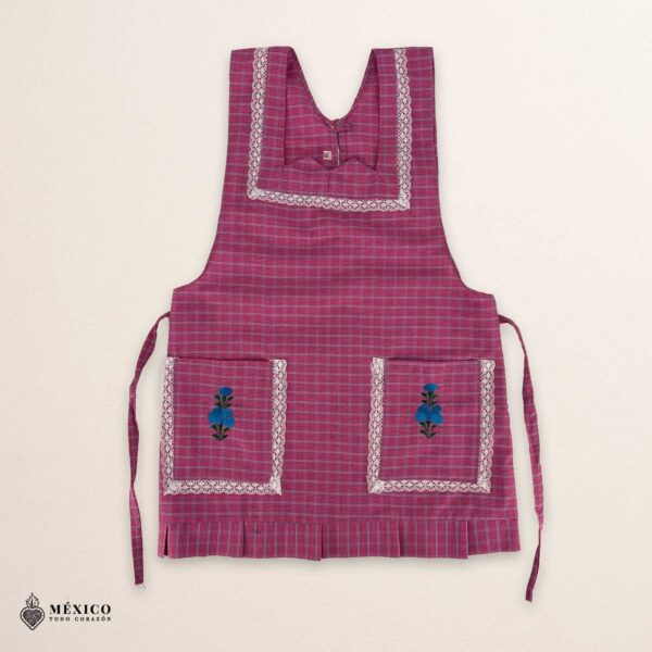 Pink Mexican embroidered apron made of essential cotton, handmade kitchen apron featuring traditional floral embroidery inspired by Mexican craftsmanship