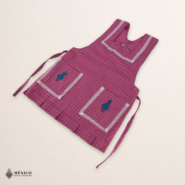 Pink Mexican embroidered apron made of essential cotton, handmade kitchen apron featuring traditional floral embroidery inspired by Mexican craftsmanship