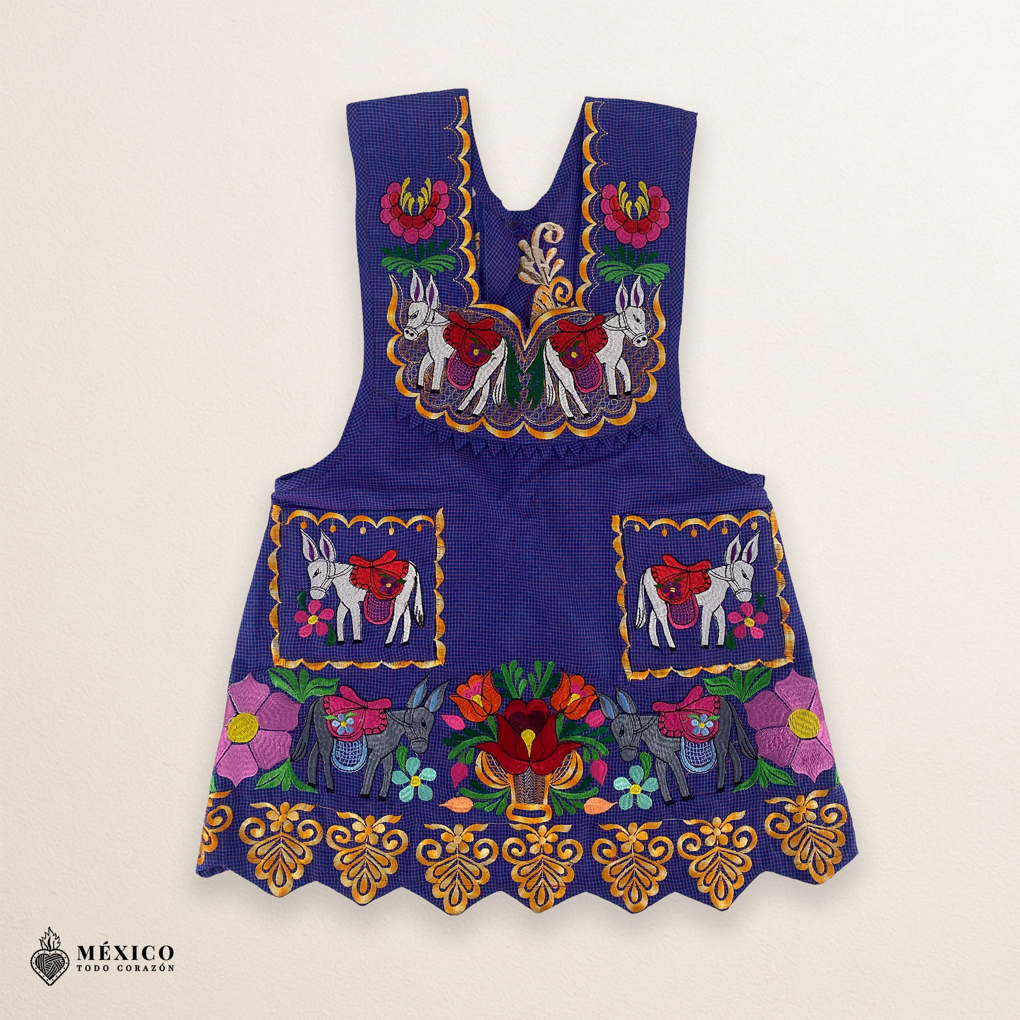 Lilac Mexican embroidered apron crafted from premium cotton blend with multicolor floral embroidery, handmade traditional kitchen apron perfect for cooking or gifting.