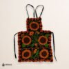 Mexican embroidered bib apron for women in multicolor cotton fabric, featuring vibrant floral design — handmade traditional kitchen apron perfect for cooking, gifts, and cultural celebrations.