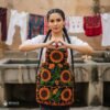 Mexican embroidered bib apron for women in multicolor cotton fabric, featuring vibrant floral design — handmade traditional kitchen apron perfect for cooking, gifts, and cultural celebrations.
