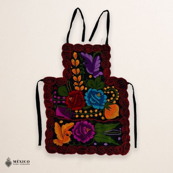 Mexican embroidered bib apron for women in multicolor cotton fabric, featuring vibrant floral design — handmade traditional kitchen apron perfect for cooking, gifts, and cultural celebrations.