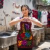 Mexican embroidered bib apron for women in multicolor cotton fabric, featuring vibrant floral design — handmade traditional kitchen apron perfect for cooking, gifts, and cultural celebrations.