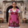 “Cherry Mexican embroidered apron crafted from premium cotton blend with elegant red floral embroidery, handmade traditional kitchen apron perfect for cooking or gifting