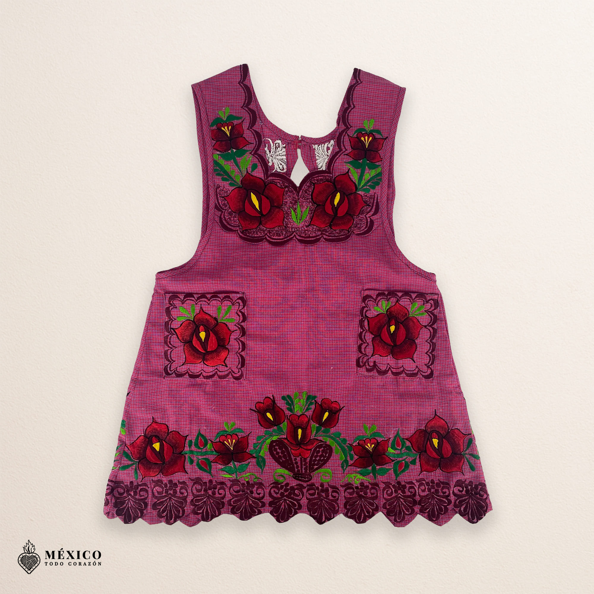 “Cherry Mexican embroidered apron crafted from premium cotton blend with elegant red floral embroidery, handmade traditional kitchen apron perfect for cooking or gifting