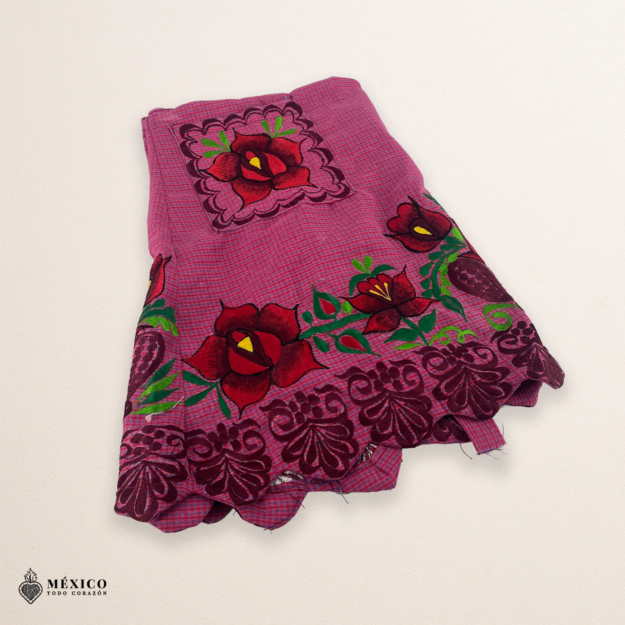 “Cherry Mexican embroidered apron crafted from premium cotton blend with elegant red floral embroidery, handmade traditional kitchen apron perfect for cooking or gifting