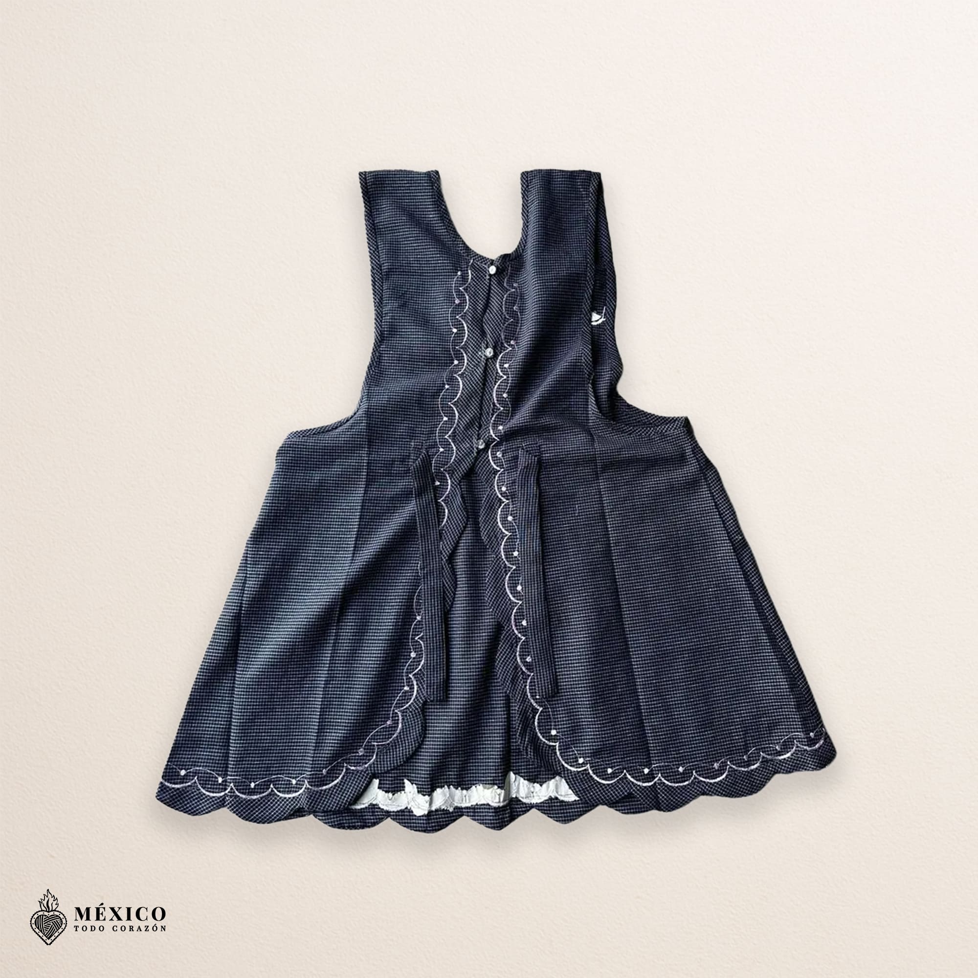 Gray Mexican embroidered apron made of essential cotton, handmade kitchen apron featuring traditional floral embroidery inspired by Mexican craftsmanship