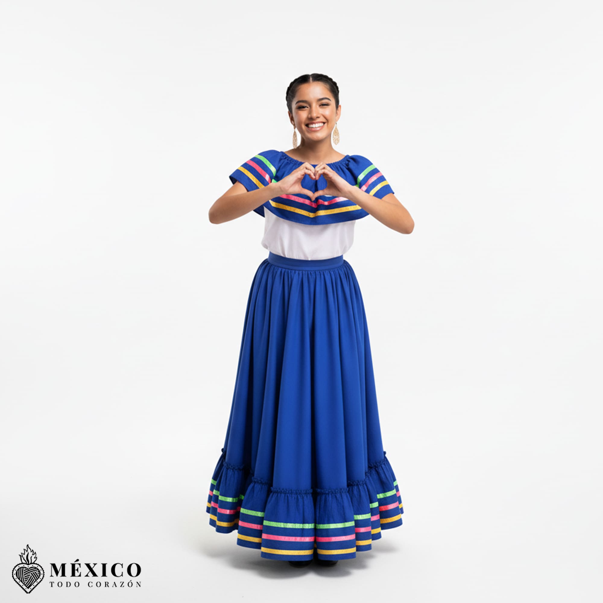 Detalle del vestido Jalisco color Azul Rey, mostrando la calidad de la tela y los listones tradicionales.